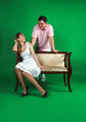 A girl and guy isolated on green A girl and guy isolated on green