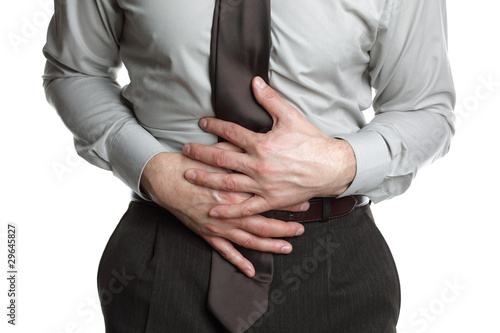 Photo: Businessman with stomach ache Businessman with stomach ache