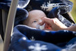 A mother giving her baby a dummy