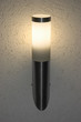 Lit outdoor lantern on wall, lamp at night