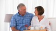 Senior couple having  breakfast together