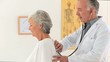 Doctor taking the pusle of his patient