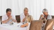 Family praying before dinner