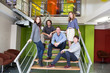 Group of people on stairs in office