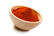 paprika powder in wooden bowl