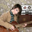 retro woman musician guitar player vintage