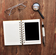 note with old photo, pen, magnifying glass and eyeglasses note with old photo, pen, magnifying glass and eyeglasses