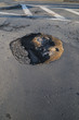Foto: pothole in a road pothole in a road