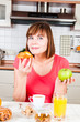 Young woman chooses healthy diet