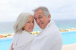 Portrait of happy senior couple in spa center