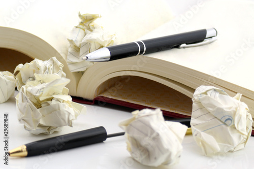 Photo: pens and book pens and book