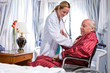 Cheerful nurse with a patient