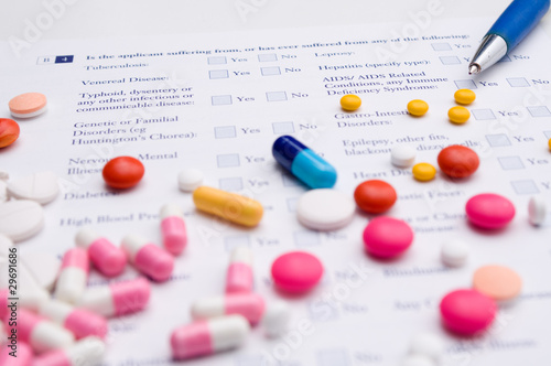 Photo: Medical form with pills Medical form with pills