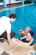 Young trainer with elder people