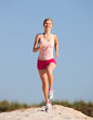 girl runs on sand