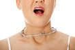 Young woman with barbed wire around her throat. Young woman with barbed wire around her throat.