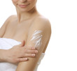 Beautiful Young Woman applying moisturizer. Spa concept Beautiful Young Woman applying moisturizer. Spa concept