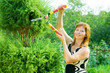 woman doing work in her garden