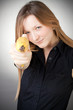 Image of girl holds banana as a gun Image of girl holds banana as a gun