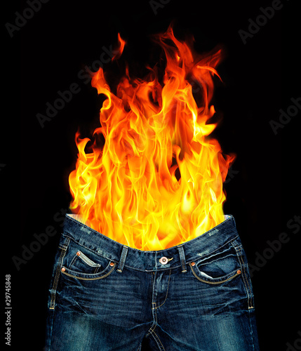 Photo: Denim jeans and fire Denim jeans and fire