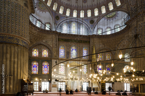 Photo: People praying in Blue Mosque People praying in Blue Mosque