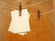vintage photographs hang on the clothespin isolated on Wood wall vintage photographs hang on the clothespin isolated on Wood wall