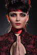 Gorgeous young woman in Japanese style clothing