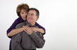 Photo: Playful Middle-Aged Couple Smiling Playful Middle-Aged Couple Smiling