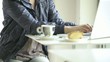 Beautiful woman working in a cafè; HD photo JPEG