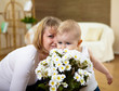 little boy with flowers