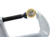 Euro coin being squeezed in a vice tool