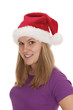 Junge freundliche Frau blickt weihnachtlich keck Junge freundliche Frau blickt weihnachtlich keck