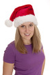 Junge freundliche Frau blickt weihnachtlich keck Junge freundliche Frau blickt weihnachtlich keck