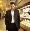 handsome man choosing an engagement ring handsome man choosing an engagement ring