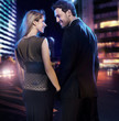 Amazing couple in love over the city background Amazing couple in love over the city background