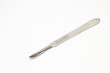 Scalpel over white background