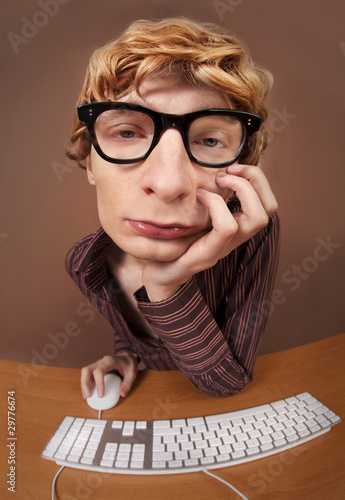 Photo: Bored office worker Bored office worker