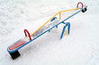 Children's swing in the winter
