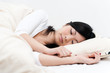 a portrait of beautiful asian woman on the bed