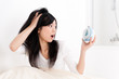 a portrait of beautiful asian woman on the bed