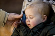 A father passing his iphone on to his son