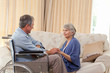 Senior couple talking in the living room at home Senior couple talking in the living room at home