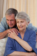 Mature man hugging his wife Mature man hugging his wife