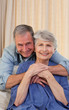 Mature man hugging his wife Mature man hugging his wife