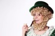Female Leprechaun smokes a pipe