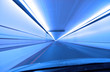 Fast drive through  a tunnel in blue color tone