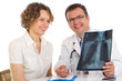 Doctor and patient looking an x-ray image Doctor and patient looking an x-ray image