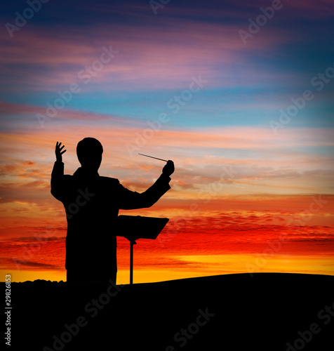 Photo: Conductor at sunset Conductor at sunset