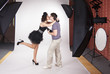 Young model kissing the photographer