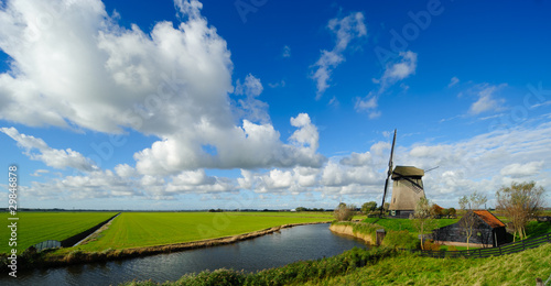 Photo: beautiful windmill landscape in the Netherlands beautiful windmill landscape in the Netherlands